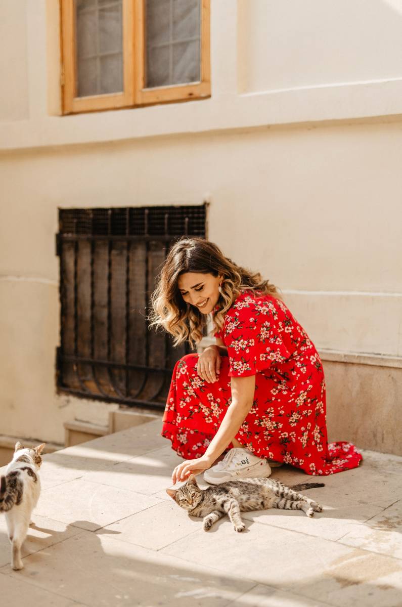 A woman in a floral dress.